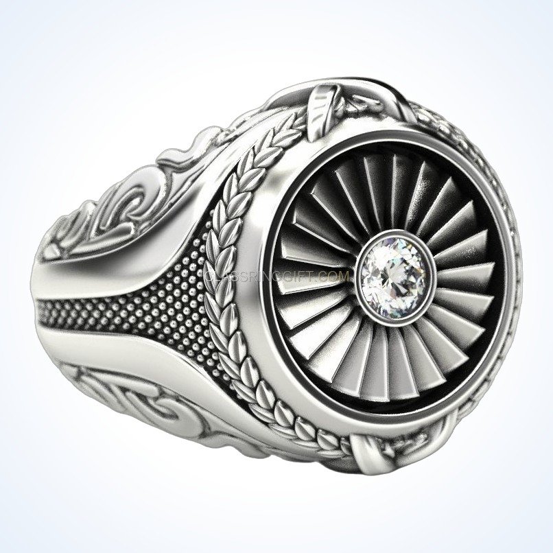 Men's sterling silver turbine engine ring with braided borders and faceted stone