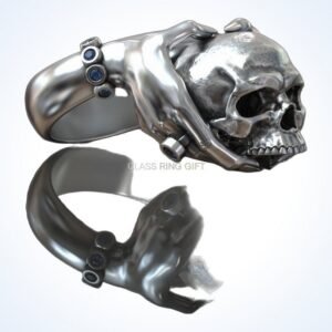 Gift for him hands holding skull ring with sapphire accents, oxidized 925 sterling silver