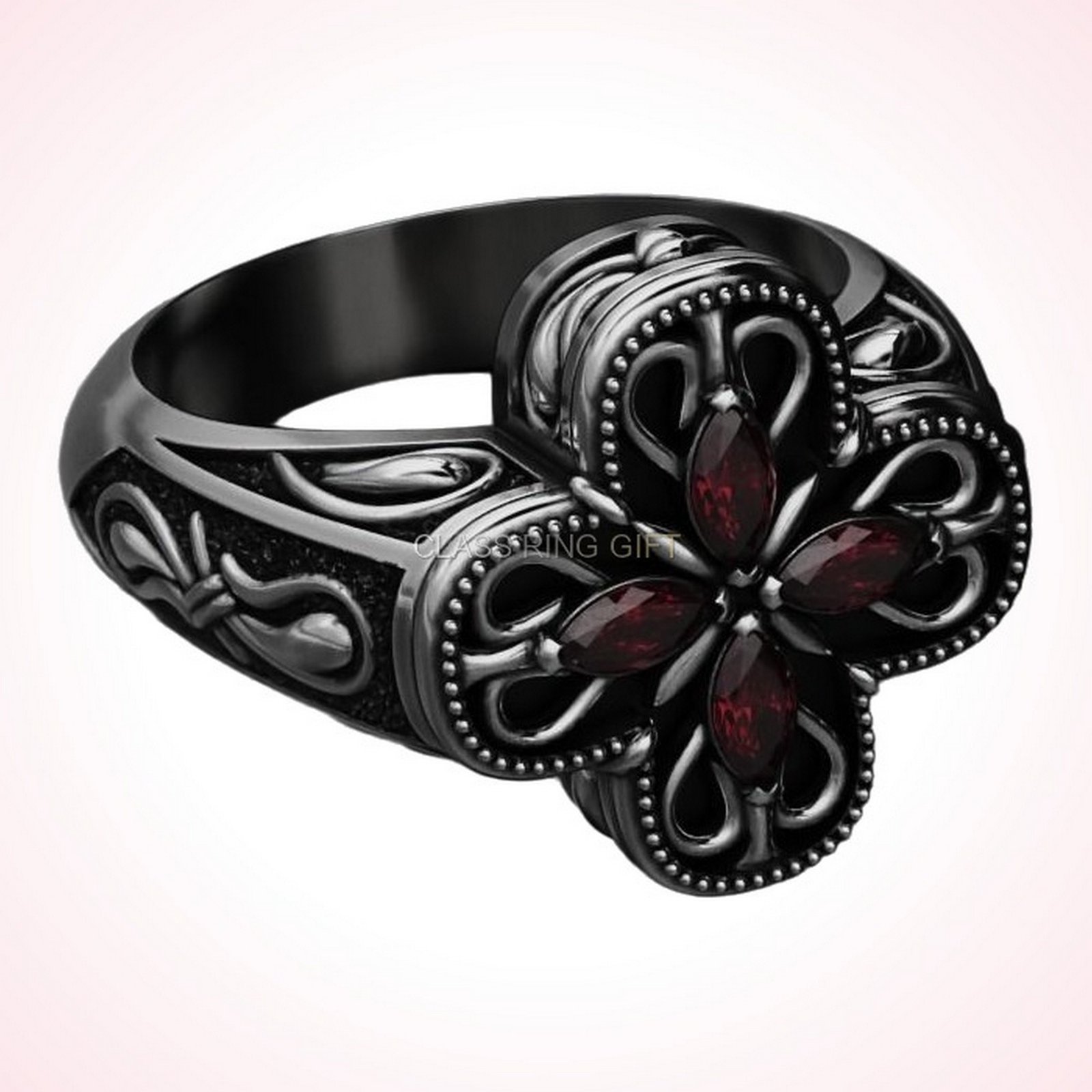 Personalized gift marquise patterns ring, front head-on view with blue gemstones